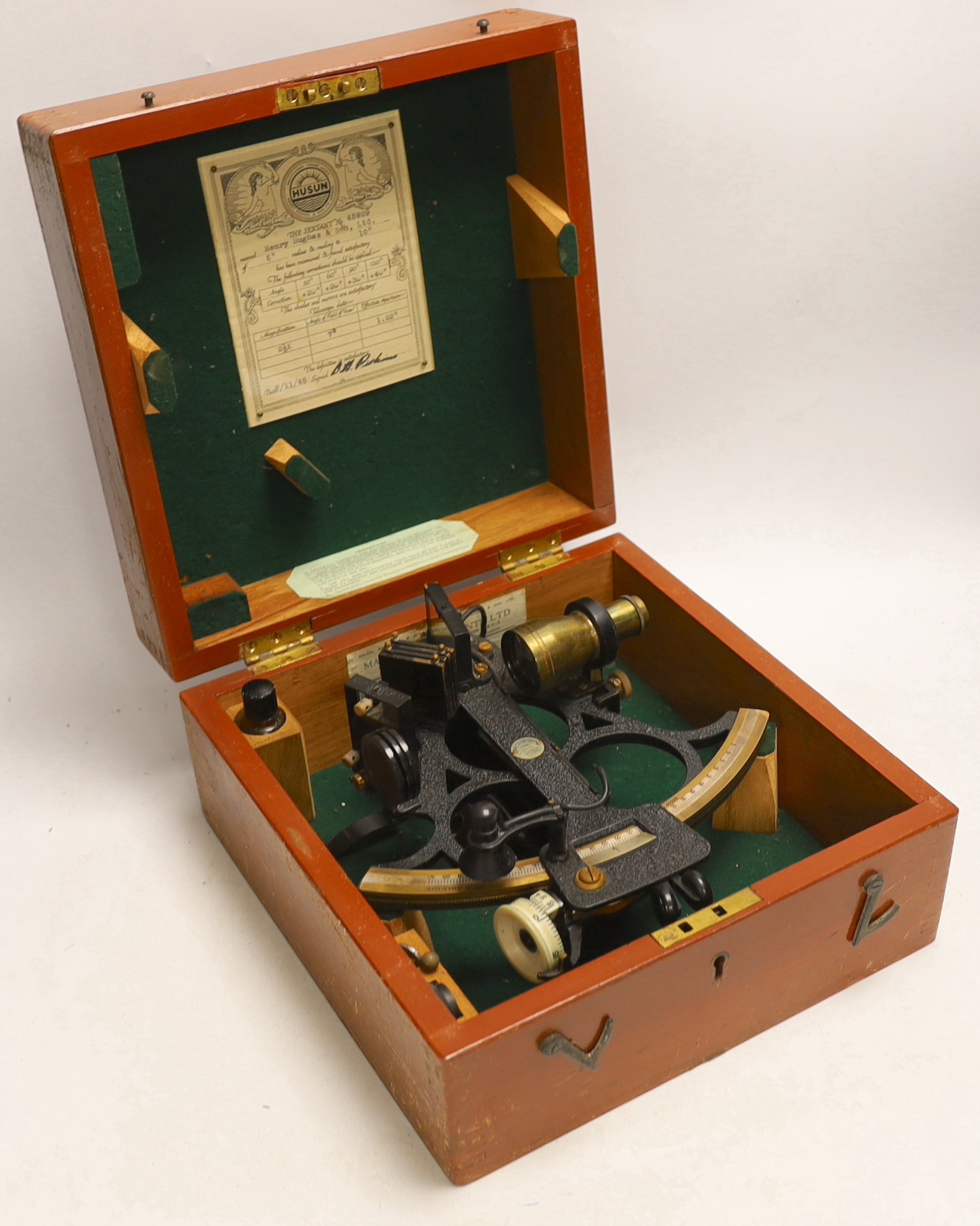 A cased mid-20th century Husun sextant in a fitted case, manufacturer inspection certificate label dated 7/11/45 inside lid, 27.5 x 26.5 x 14cm